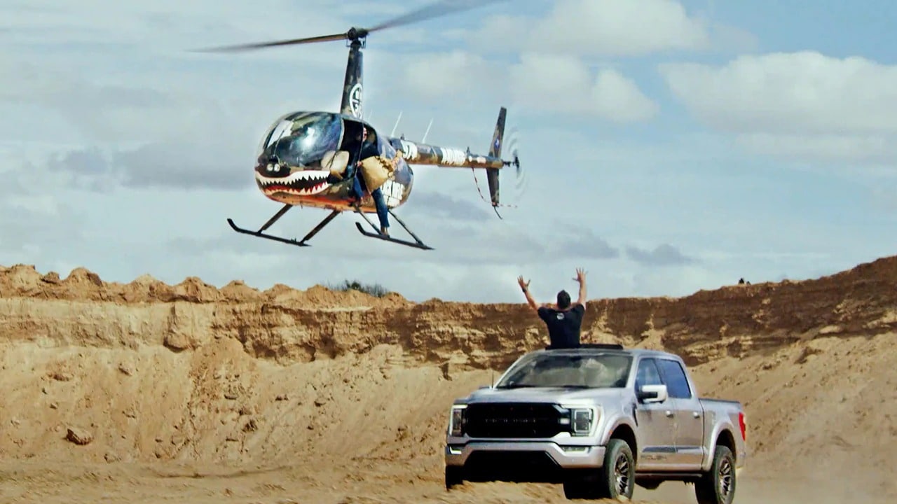 A Ford F150 truck and a helicopter.