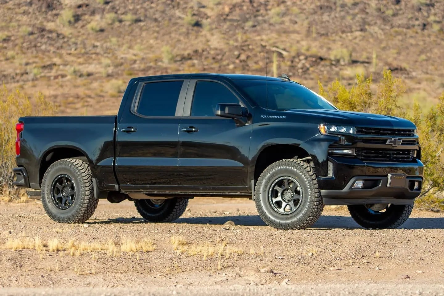 A 2019 Chevrolet Silverado on a dirt road.