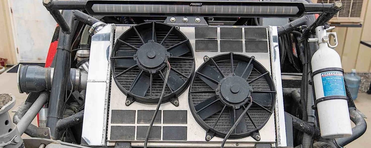 Two fans on a radiator mount.