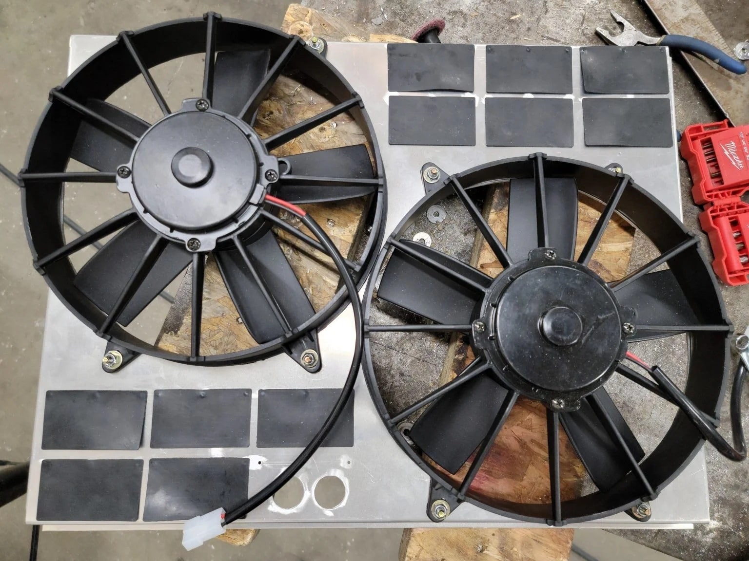 A radiator fan mount.