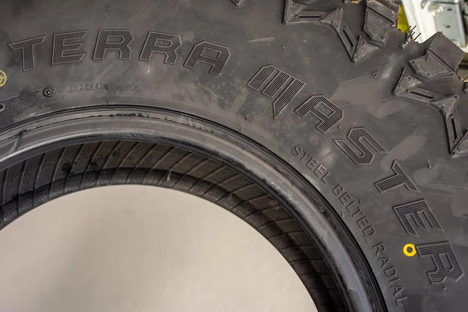 tire details print on a GBC Terra Master tire.