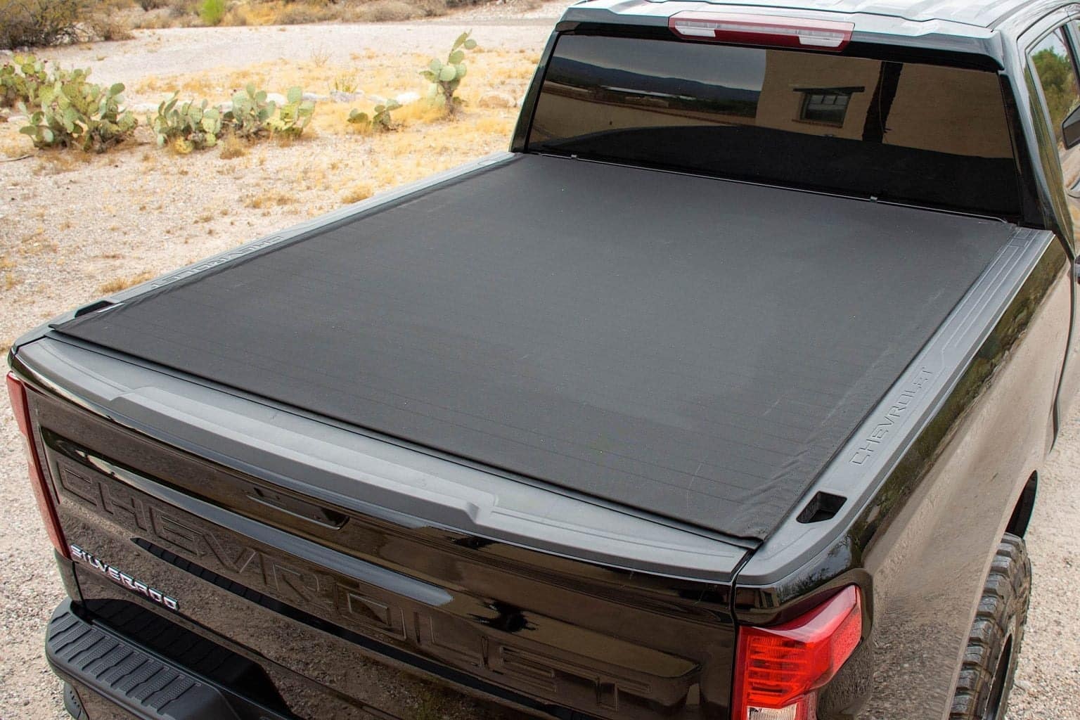 Truck gear by line-x truck bed cover.