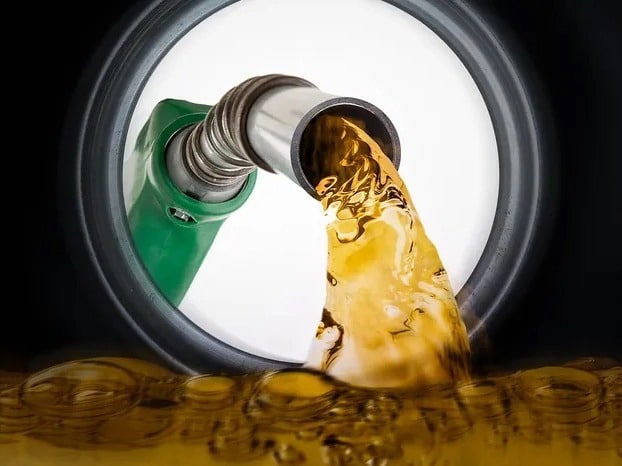 fuel pouring out of a nozzle.